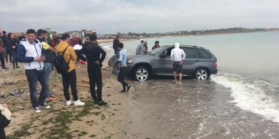 Cine este soferul teribilist cu BMW care a ramas blocat cu masina pe plaja din Vama Veche